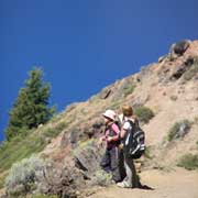 Hikers on trail over Crater Lake